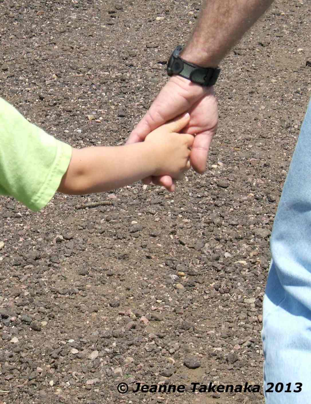 Man child holding hands