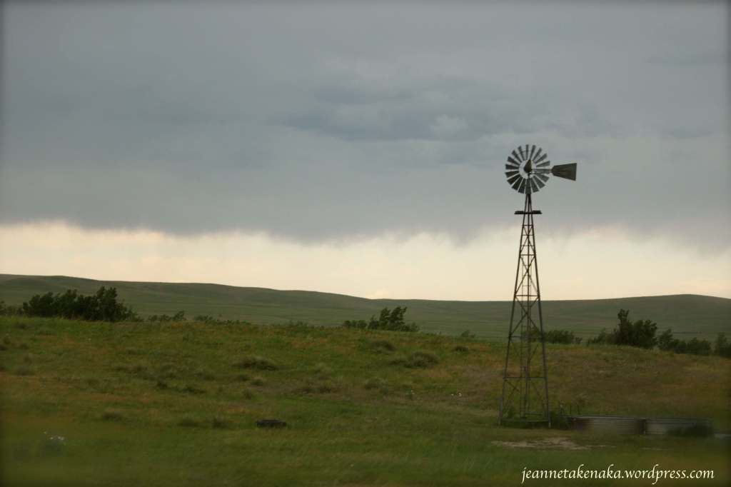 Windmill and stormy sky